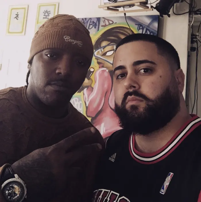 Big D in a Coogi beanie, left, with MC Solar Wind in a Bulls jersey at TME PRO Recordings, New York