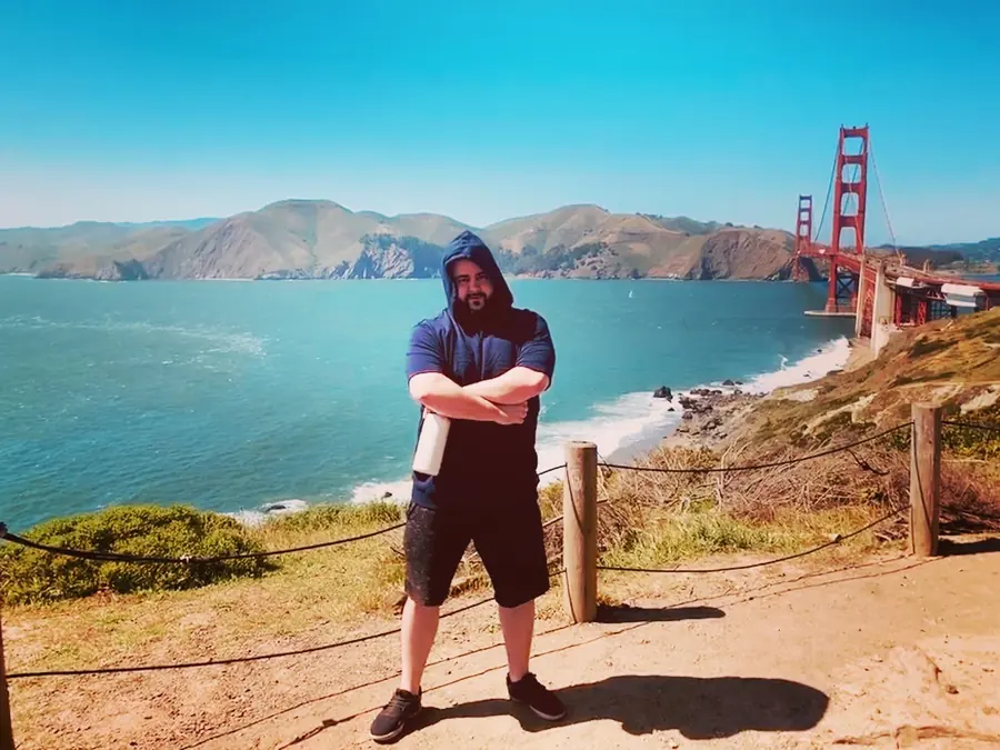 MC Solar Wind standing above the Golden Gate Bridge