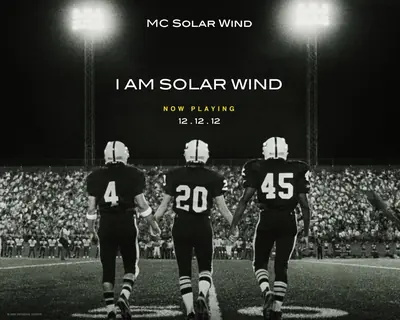 I AM SOLAR WIND mixtape cover: three football players walking onto a lit field